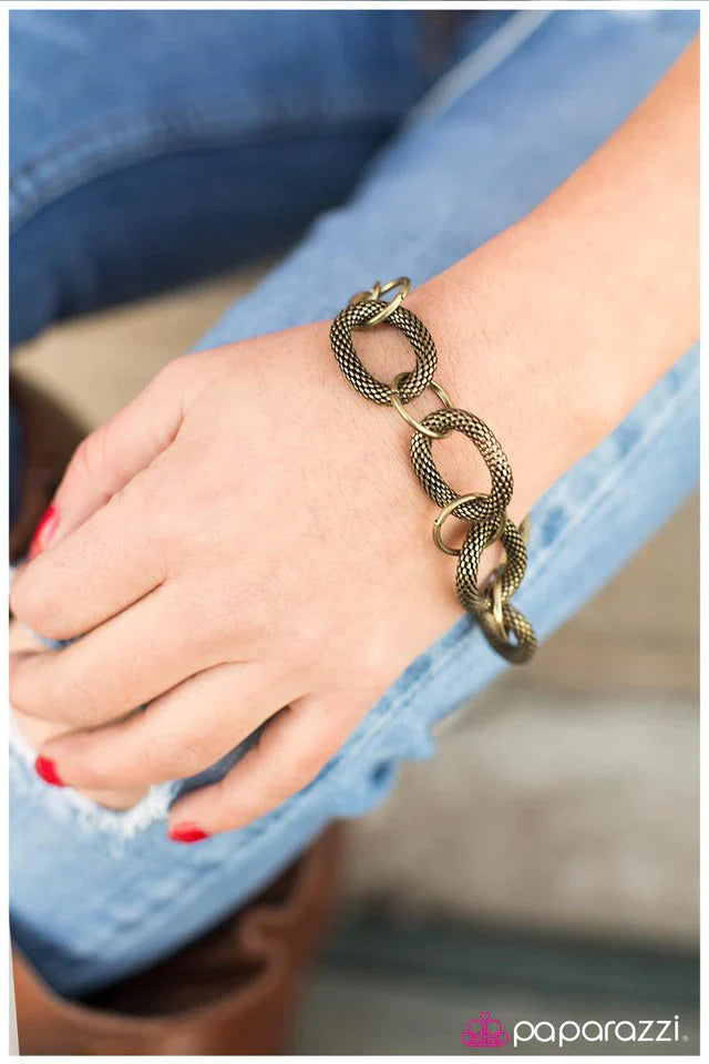 Paparazzi Bracelet ~ Ring In the New - Brass