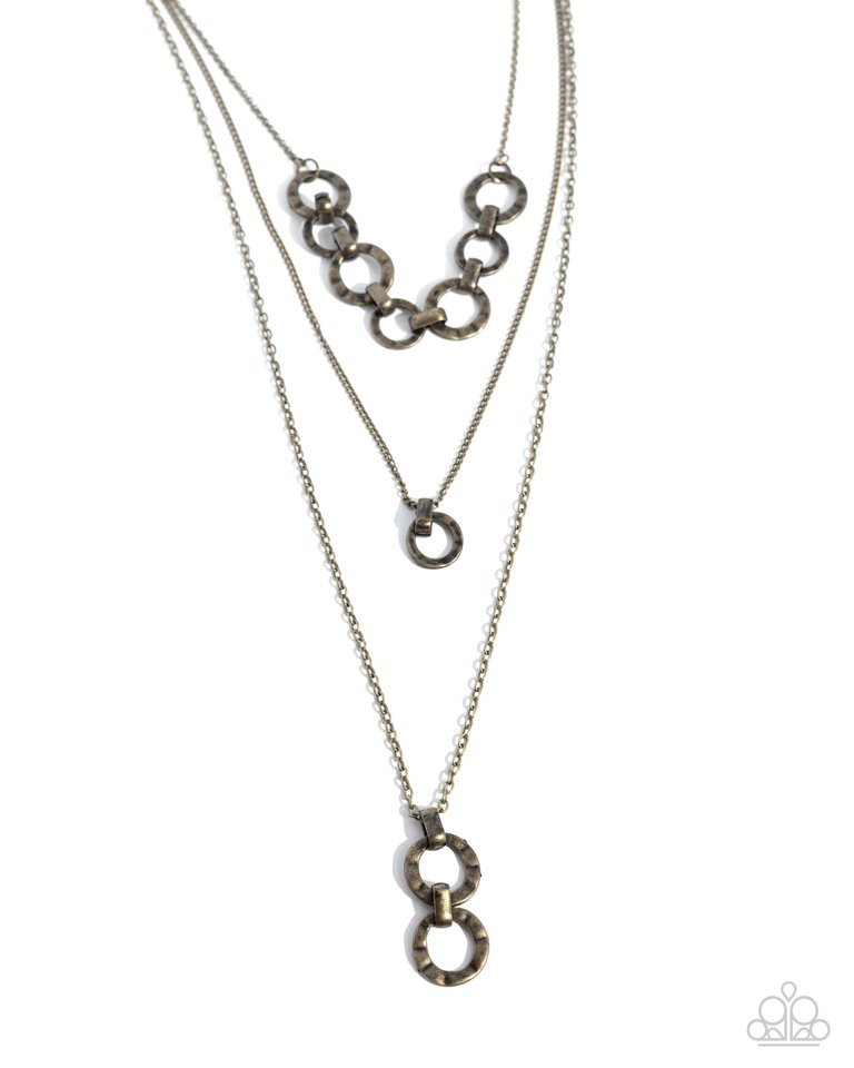 Dotted Demeanor - Brass - Paparazzi Necklace Image