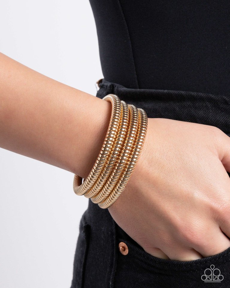 Casual Coils - Gold - Paparazzi Bracelet Image