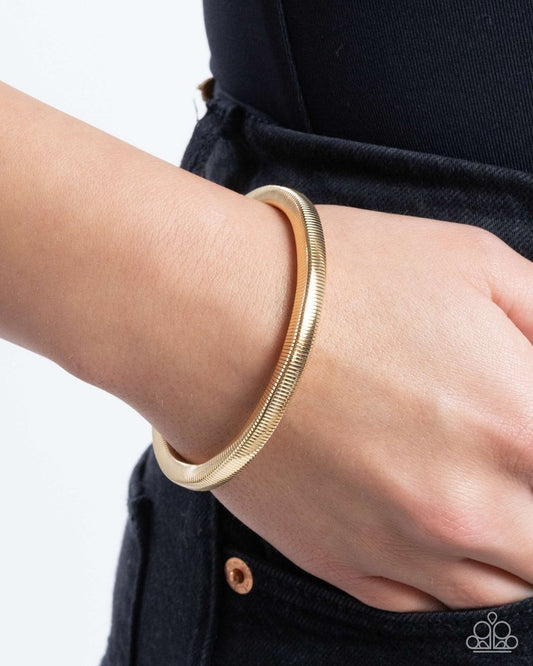 Stubborn Simplicity - Gold - Paparazzi Bracelet Image