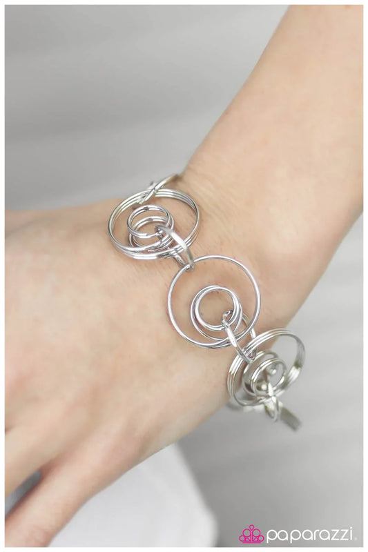 Paparazzi Bracelet ~ Chasing Your Tail  - Silver