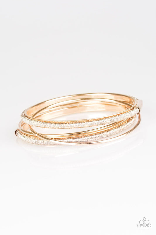 Paparazzi Bracelet ~ Pay A Hefty SHINE - Rose Gold